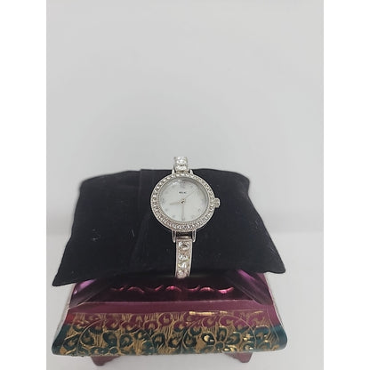 RELIC WOMEN'S DRESS WATCH WITH GEMS AROUND BLUE FACE & ON BRACELET WORKS!